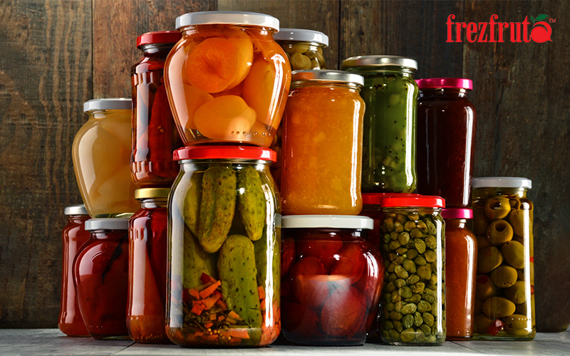 Jars With Pickled Vegetables, Fruity Compotes and Jams