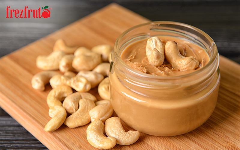 Cashew butter spread in a jar and cashew